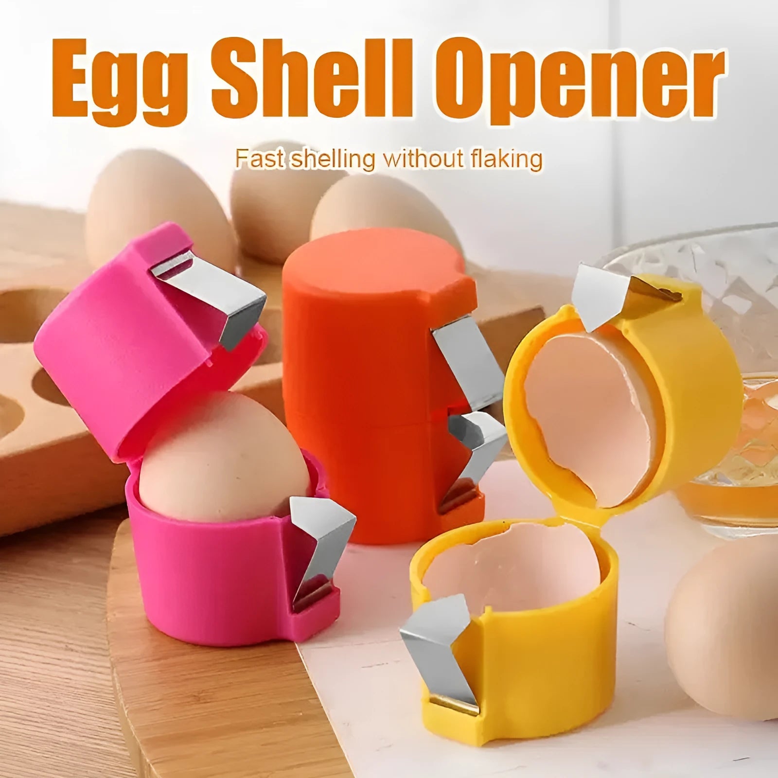 Egg shell opener kitchen tool in orange colour with stainless steel blades