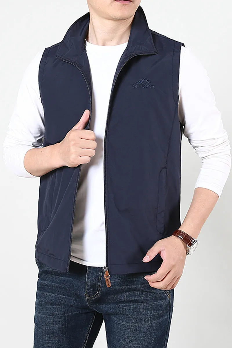 Niandun men's thin casual waistcoat vest in a chemical fibre blend with side pockets.