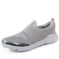 Women's low-top blue mesh sneakers on a white background.
