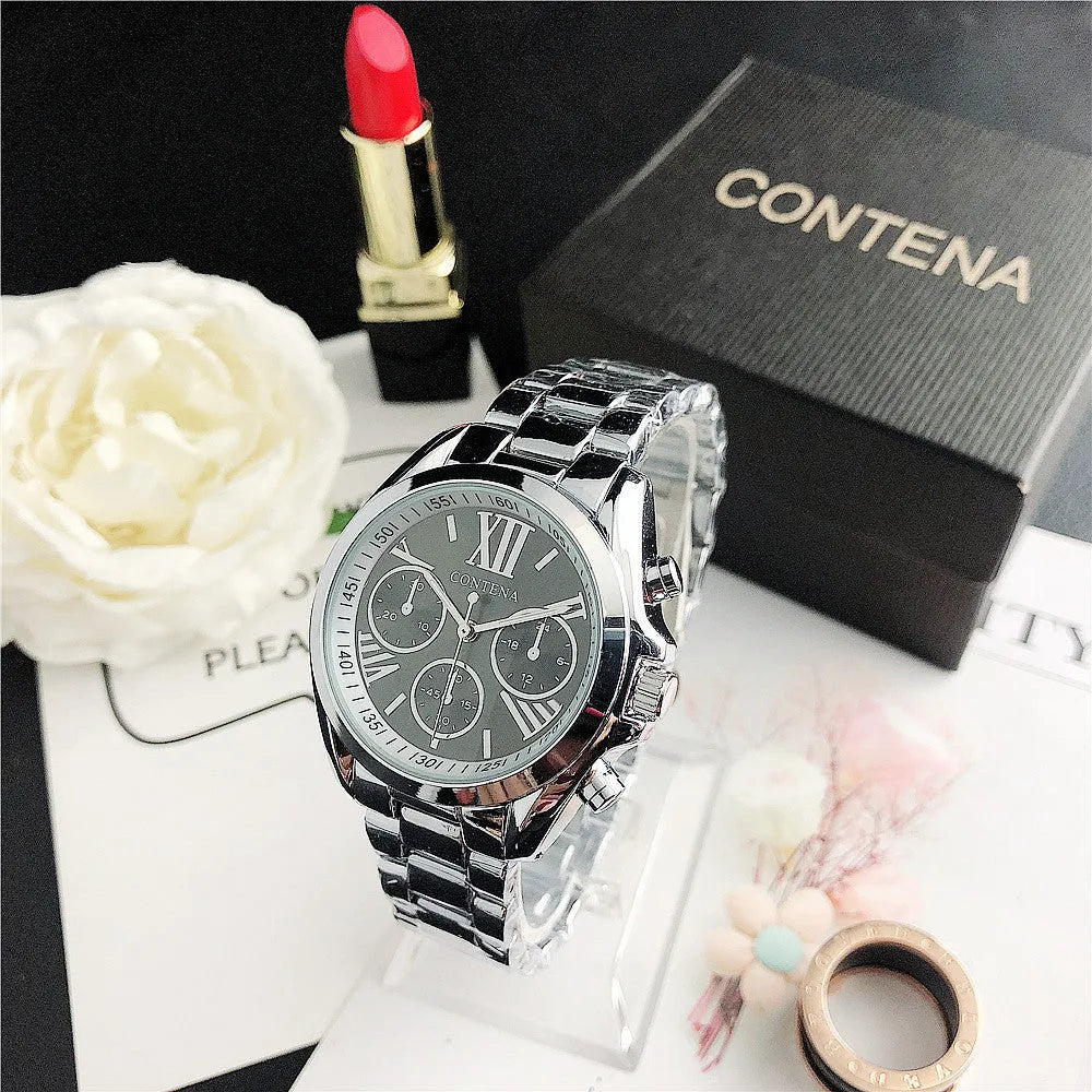 Women's silver and rose gold quartz watch with mesh strap and pointer display.