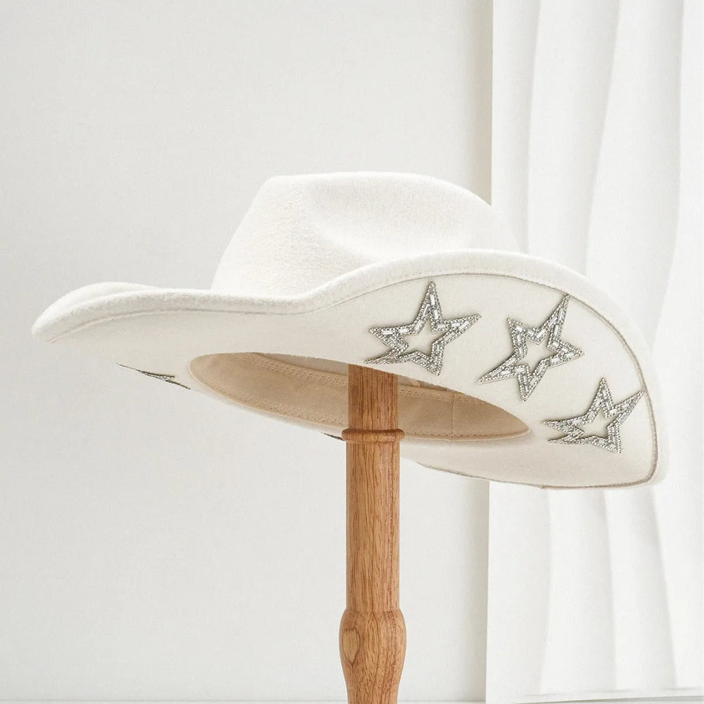 Beige woven polyester western-style top hat with a conical crown on a neutral background.