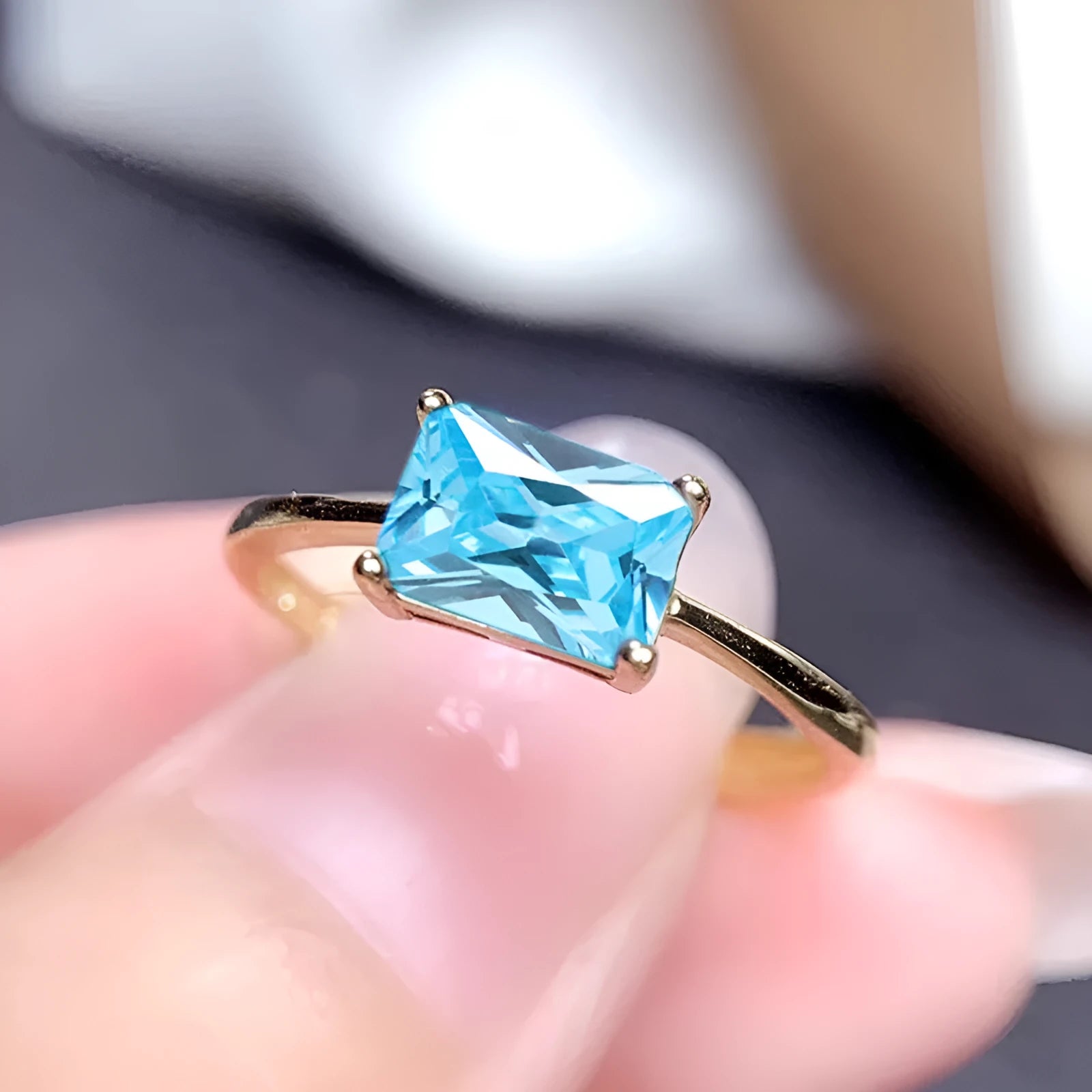 Sapphire blue geometric bracelet ring with zircon stones and heart-shaped elements on copper
