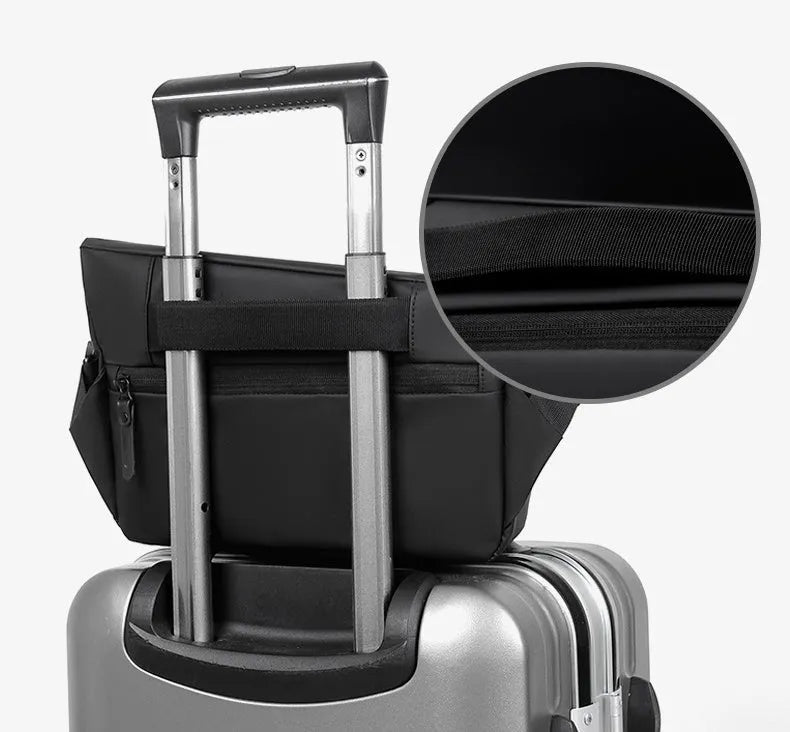 A grey medium-sized horizontal square PU crossbody bag for men, showing the shoulder strap and front zipper.