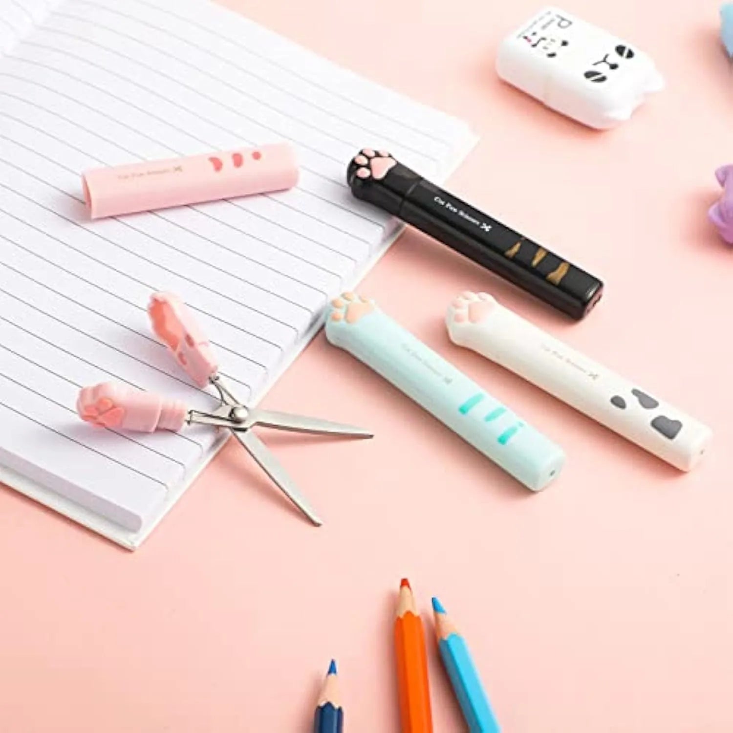 Cat paw mini folding scissors in four colours with stainless steel blades and decorative handles