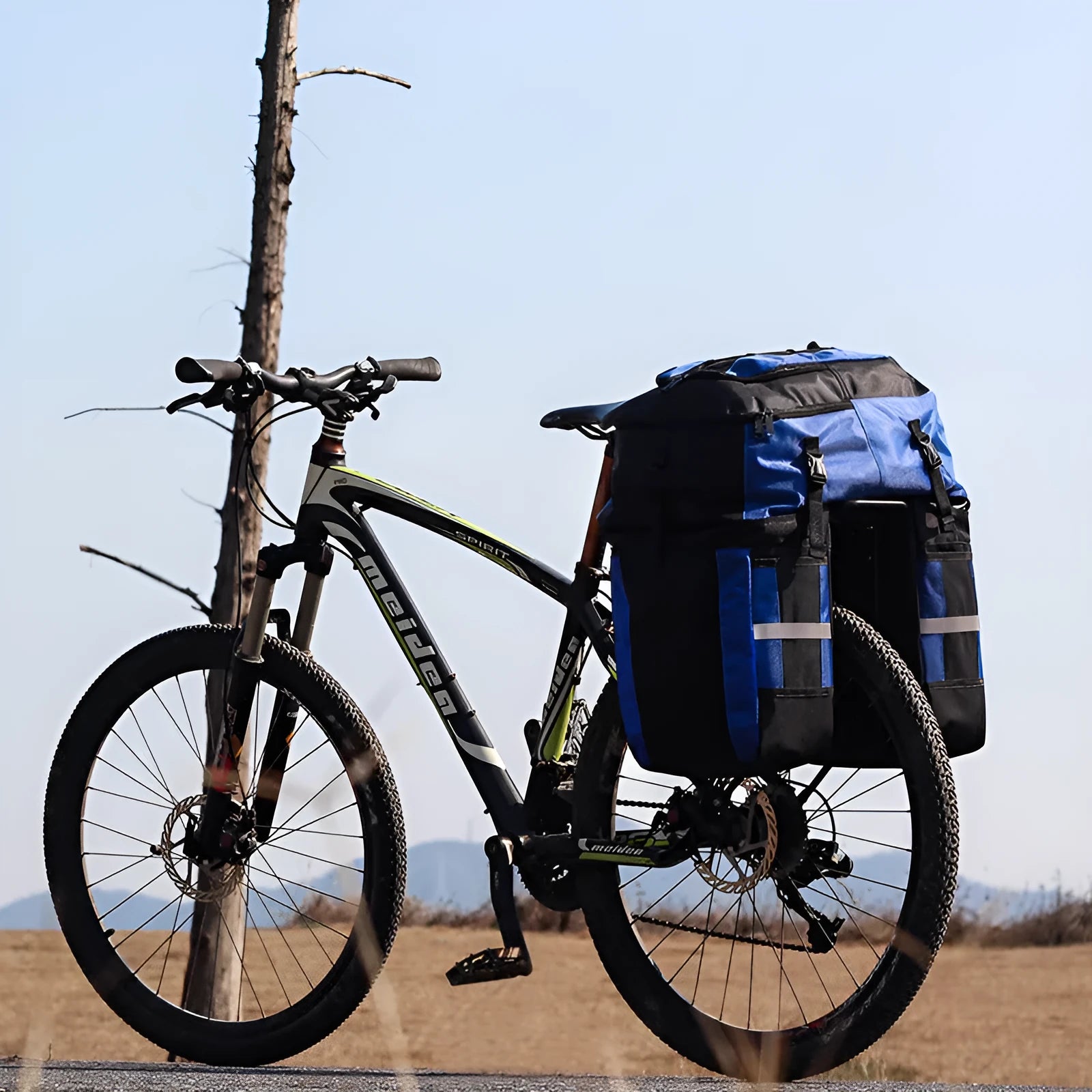 70 litre capacity blue polyester bicycle rear storage frame bag for long-distance touring.