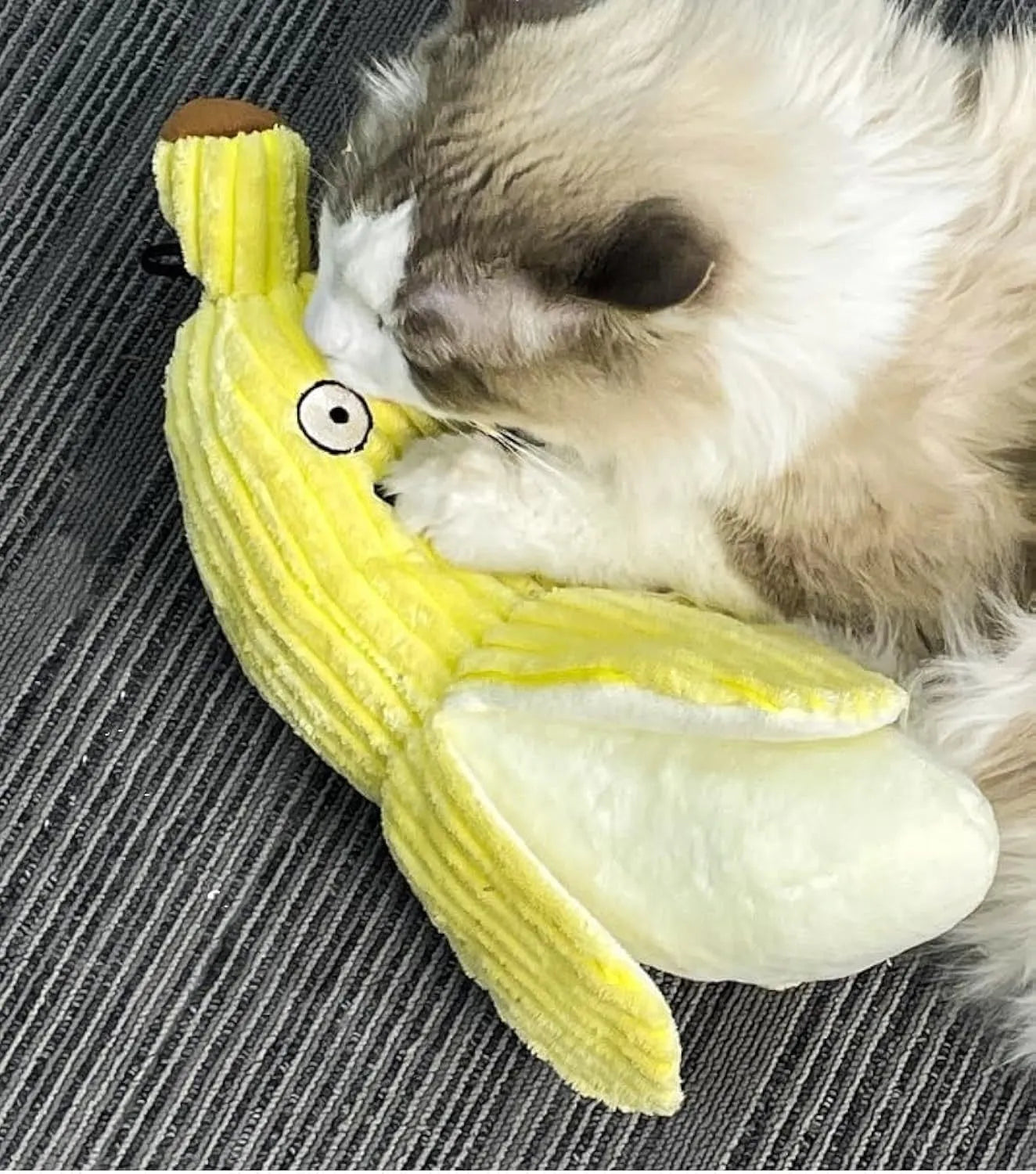 Yellow banana-shaped cat chew toy with plush fabric and crinkle sound feature