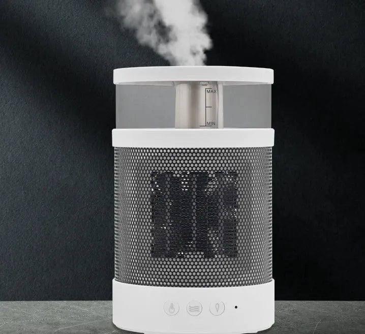 White 3 in 1 portable space heater with 400ml humidifier and colourful night light on a desk