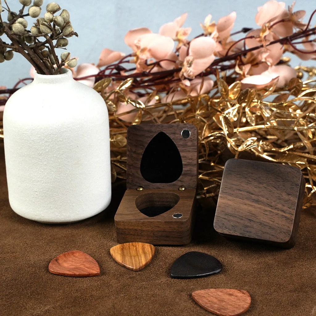Wooden guitar pick box storage container made from Sapele wood with a brown finish