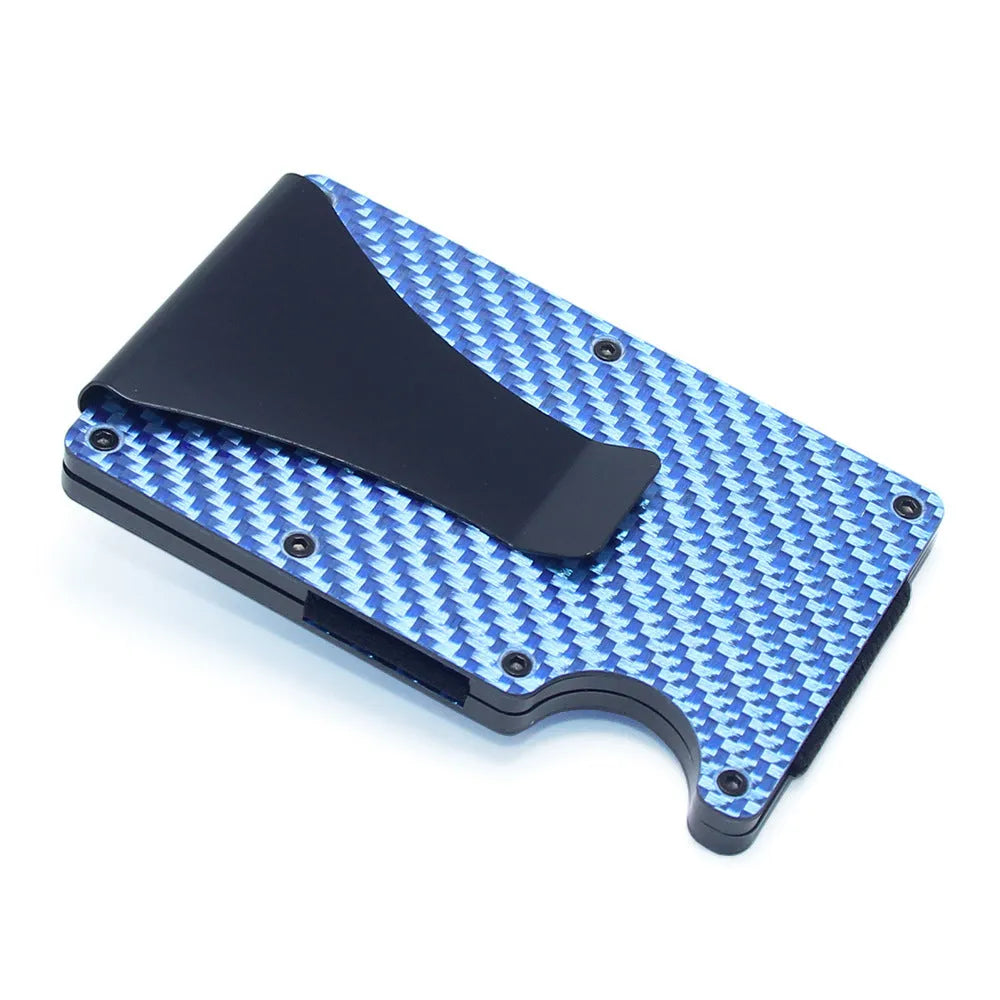 Slim black carbon fibre card holder wallet with geometric design on a gift box.