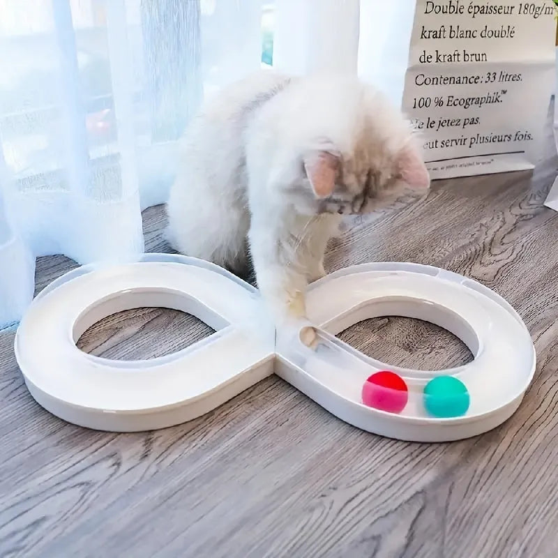Cat toy set with turntable track ball amusement centre and teasing cat stick on blue background