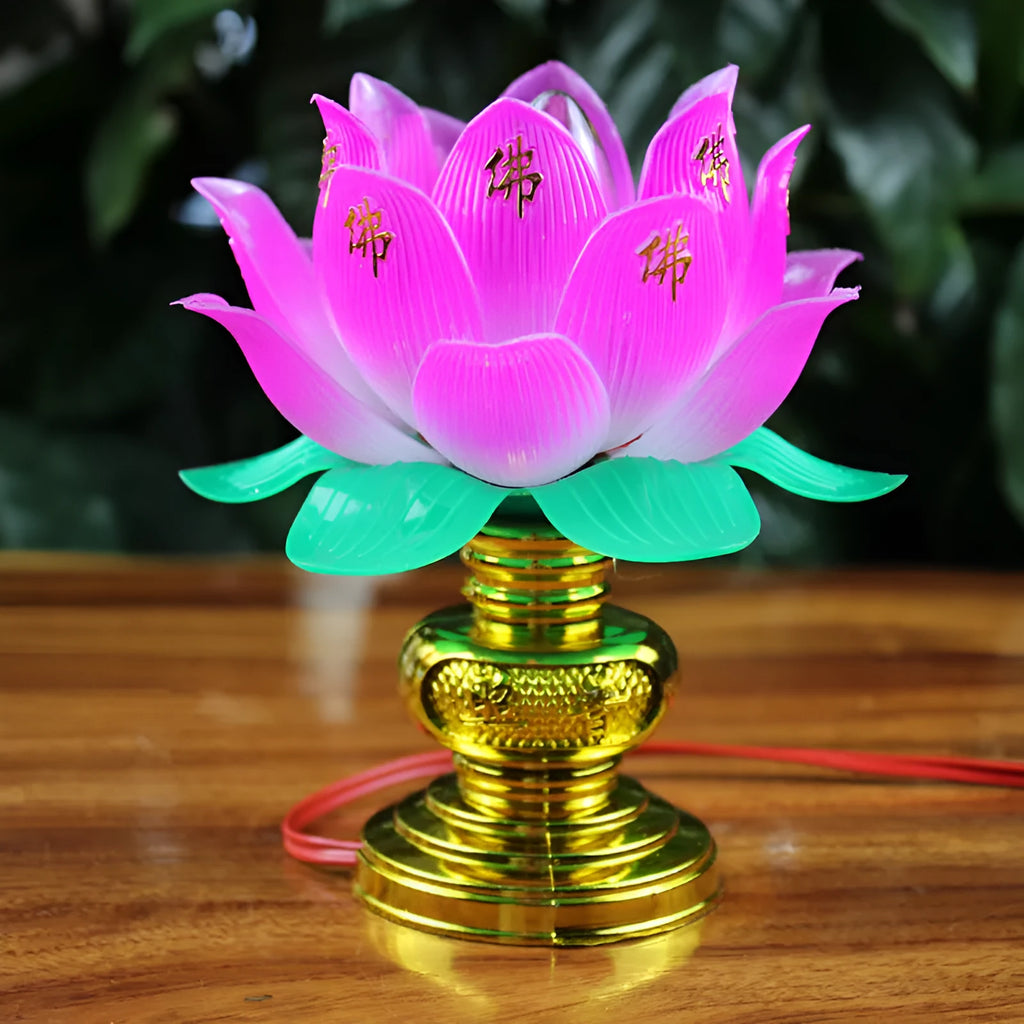 Plug-in Buddha worship lamp with colourful LED lotus flower design on a home altar.