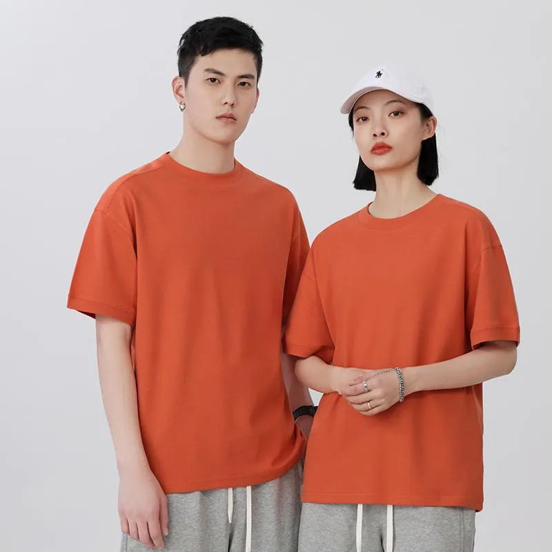 Short-sleeved loose-fit cotton pique T-shirt for youth in solid colour options