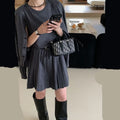 Grey women's knitted vest skirt and cardigan two-piece set with 3D pattern and belt.