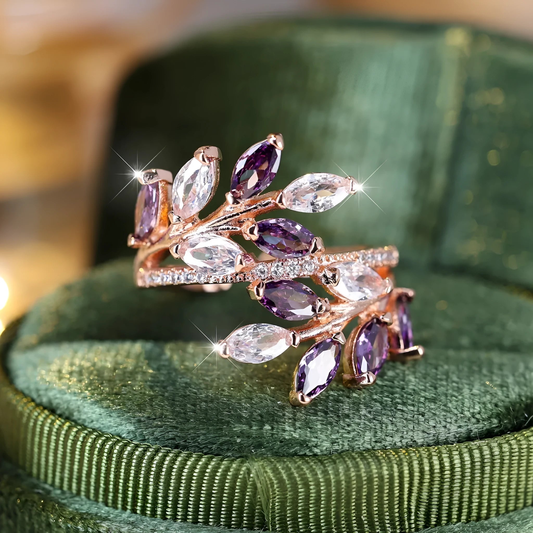Copper leaf-shaped ring with horse eye design and zircon stones on a finger, showing adjustable opening.