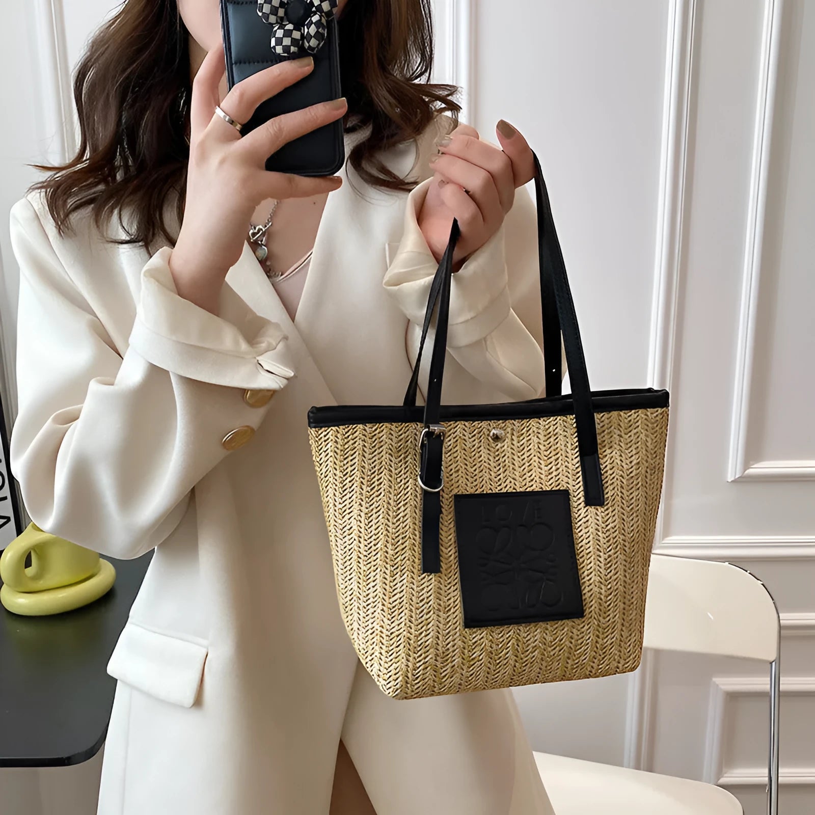 White straw woven women's shoulder bag with three-dimensional pockets showing European retro styling details