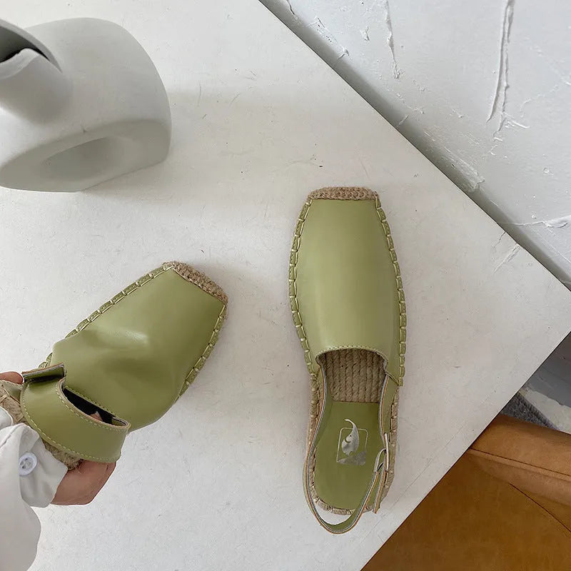 Women's beige retro fisherman flat sandals made of soft leather and animal pattern canvas with a flat sole.