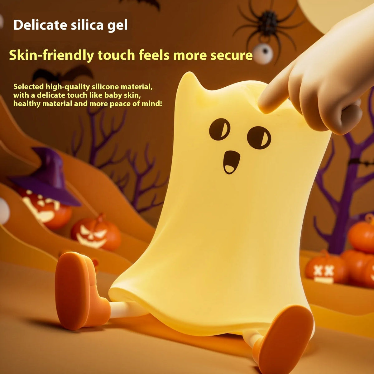 Cartoon ghost-shaped silicone bedside lamp with touch control, soft yellow glow on a bedside table
