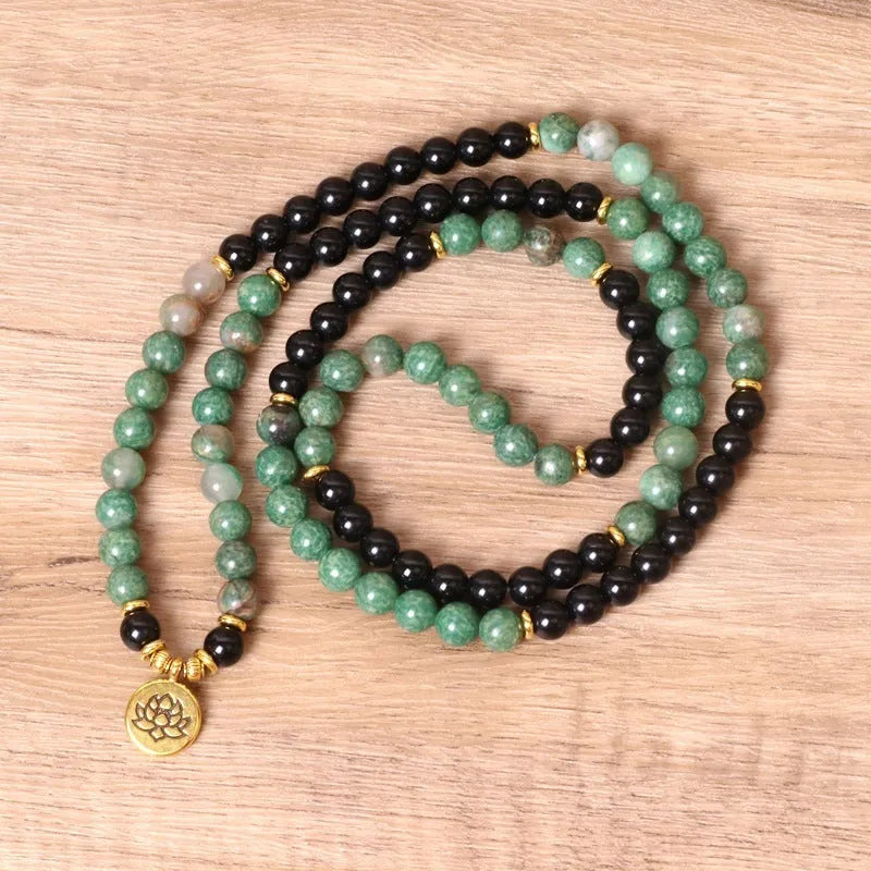Green and black elastic beaded long bracelet with alloy beads on stretch cord