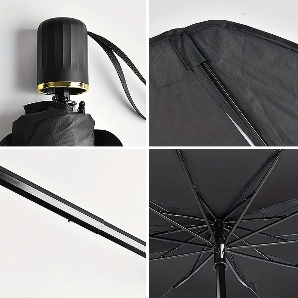 Open foldable car windshield sunshade umbrella placed against a car windscreen.