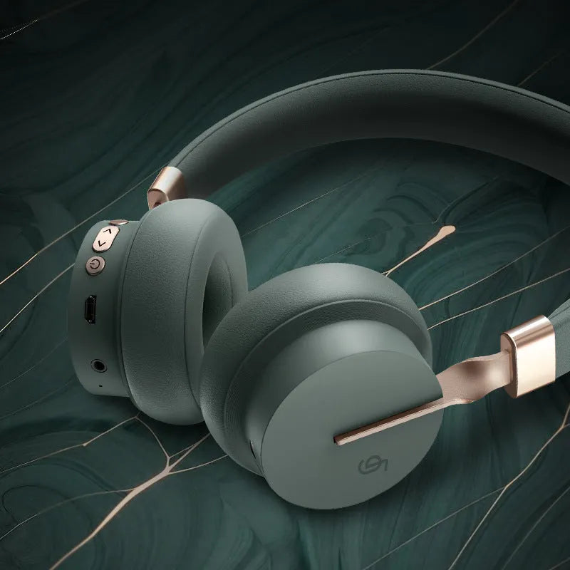 Simple solid colour headworn Bluetooth phone headset shown in one of five colour options.