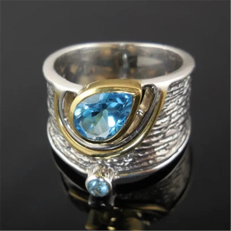 Blue Chinese style zircon ring with drop shape setting on alloy band