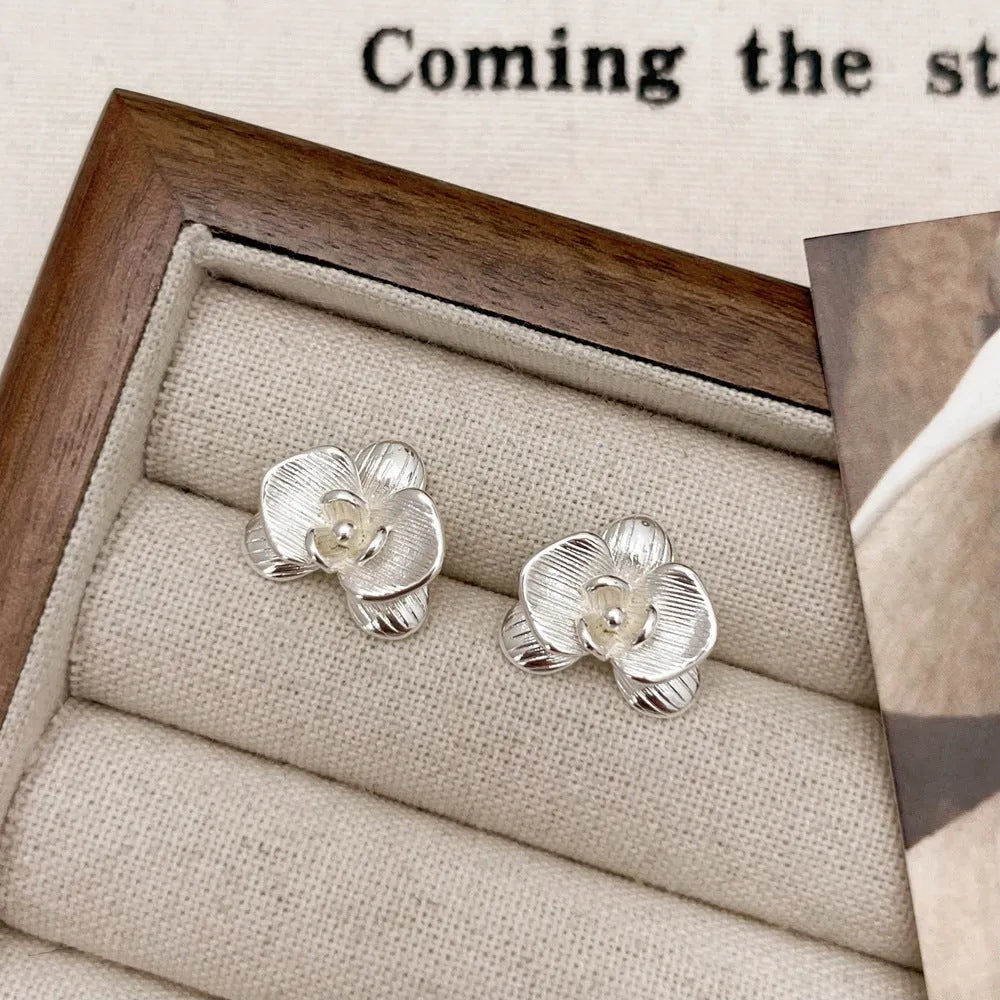 Retro flower earrings with petal design in gold and silver electroplated finishes