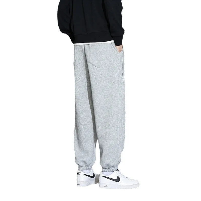 Men's loose fit casual sports trousers in gray, black, or army green with drawstring waist