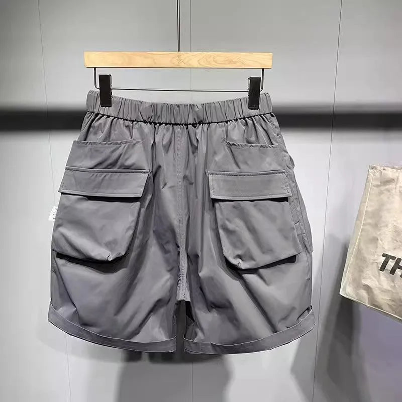 Men's large size work shorts with pockets in black or grey with straight-leg styling
