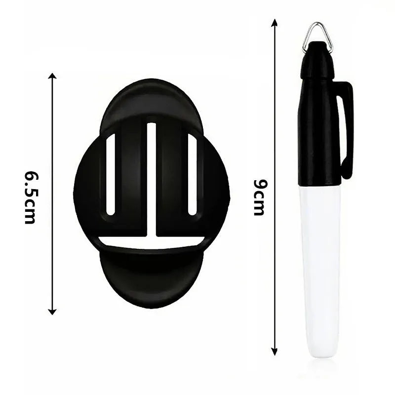 Golf putting alignment tool set with plastic scribers and drawing pens on a green.