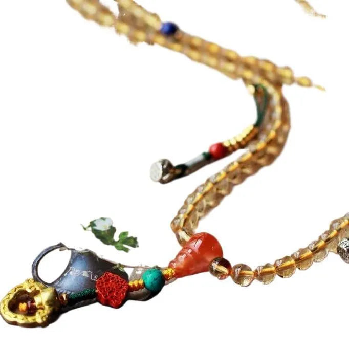 Brazilian natural citrine bracelet with 1mm yellow beads on filament cord