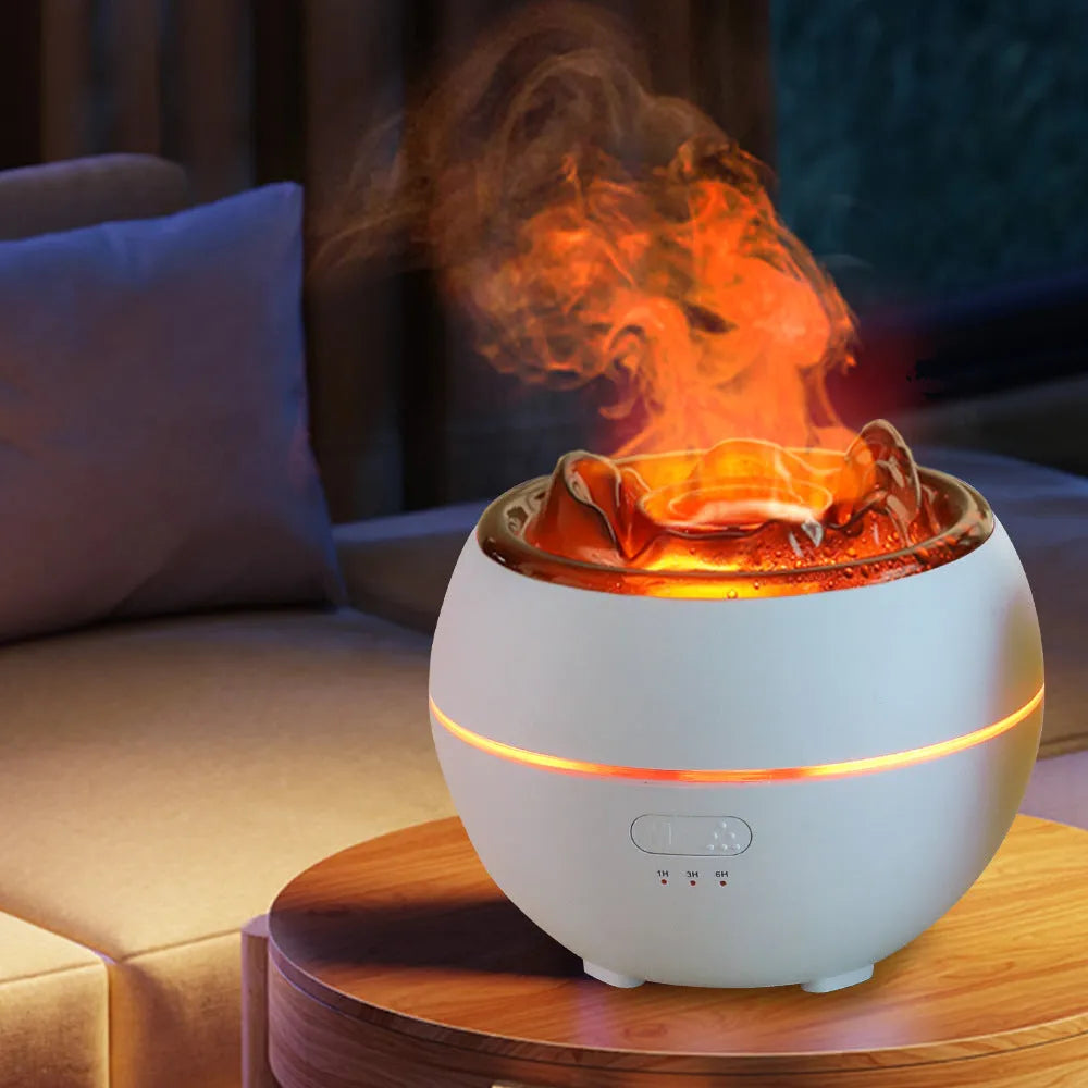 White round flame aroma diffuser humidifier with water tank and timer controls on a desk.