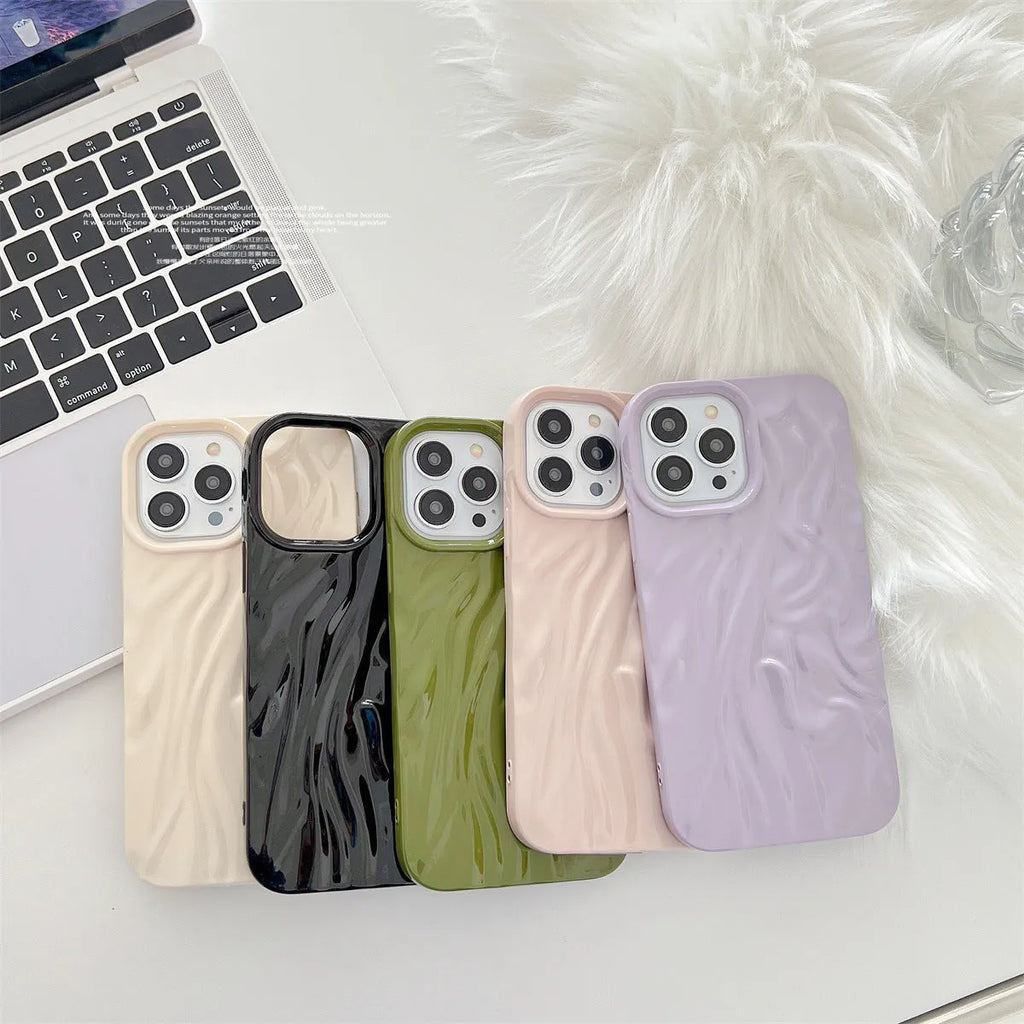 Ins-style water ripple silicone phone case for iPhone in milky white, showing textured surface.