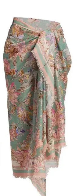 Creamy white floral print women's bikini set with attached skirt, showing top, briefs, and skirt components