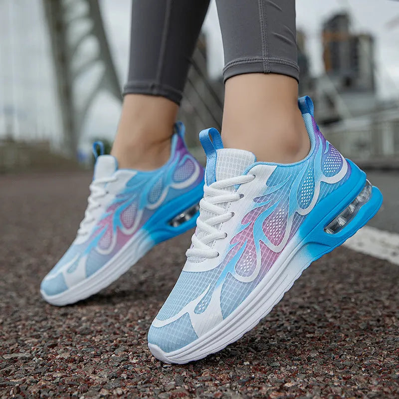 Women's casual sneakers with mesh upper and PU sole in pink, plum red, or moonlight colour.