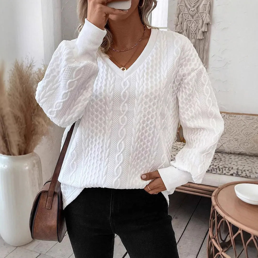 Woman's loose fit milky white long sleeve T-shirt with 3D pattern detail