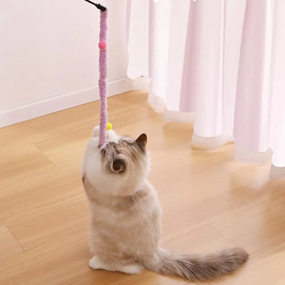 Cat teaser wand with long plush strip and colourful elements for interactive play