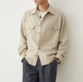 Men's long sleeve cotton shirt with a lapel collar in light sand rice colour.