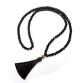Tiger eye stone beaded necklace and bracelet set with tassel pendants on white background