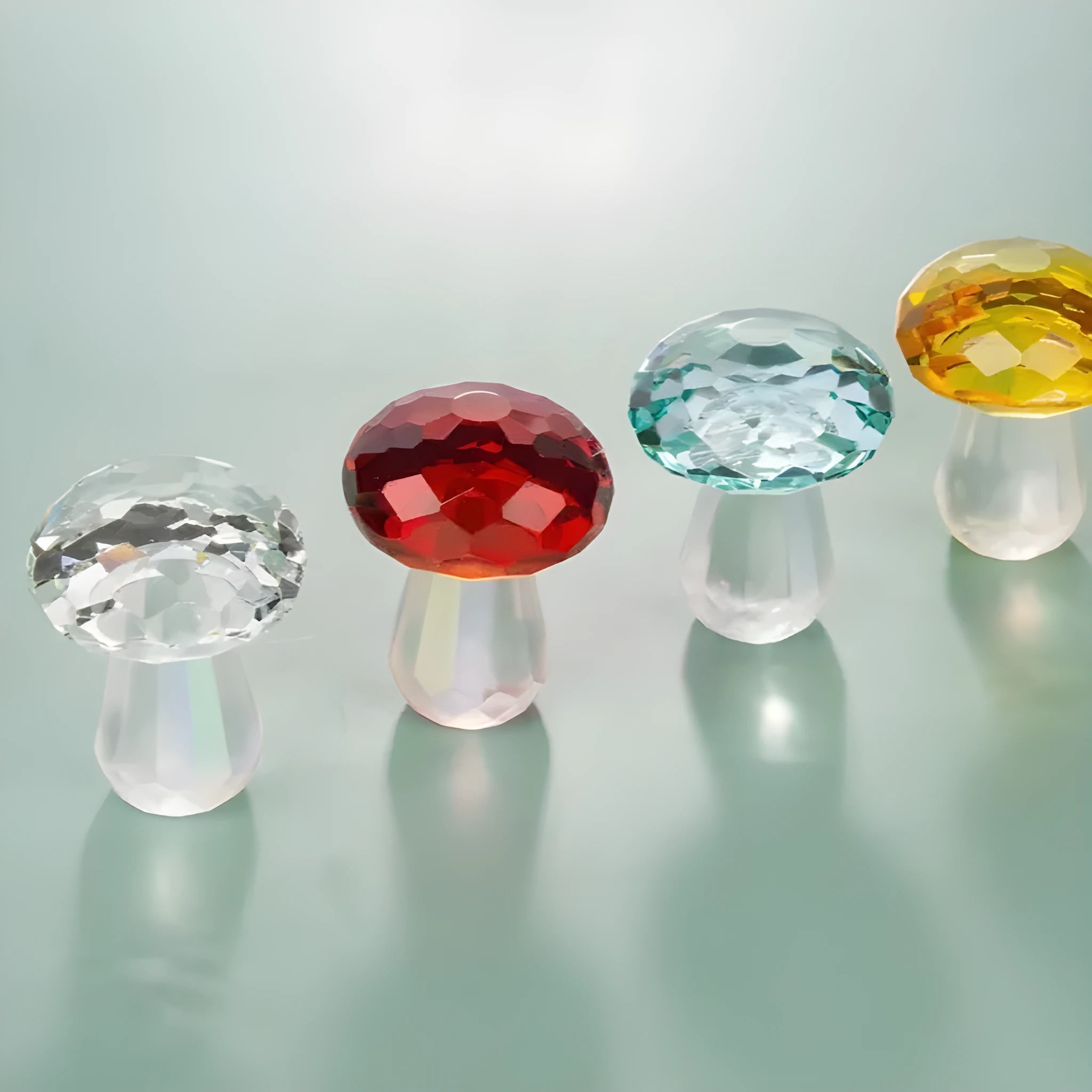 Colourful geometric mushroom crystal decorative ornament in transparent, green, red, or yellow.