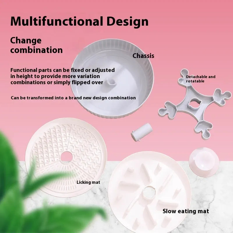 Grey rotating pet bowl with a windmill-pattern silicone licking mat insert for slow feeding.