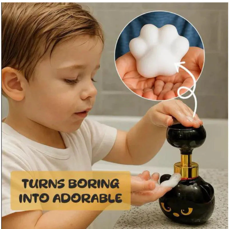 Black cat-shaped plastic soap dispenser with cartoon decoration
