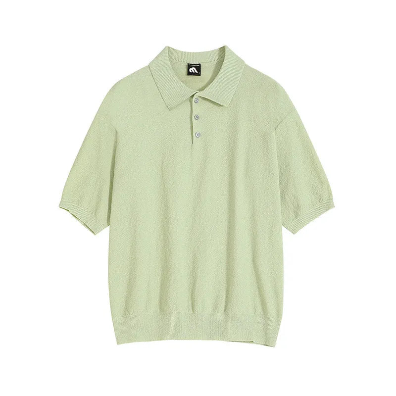 A man's caramel coloured retro knitted polo shirt with short sleeves and an asymmetric design detail.