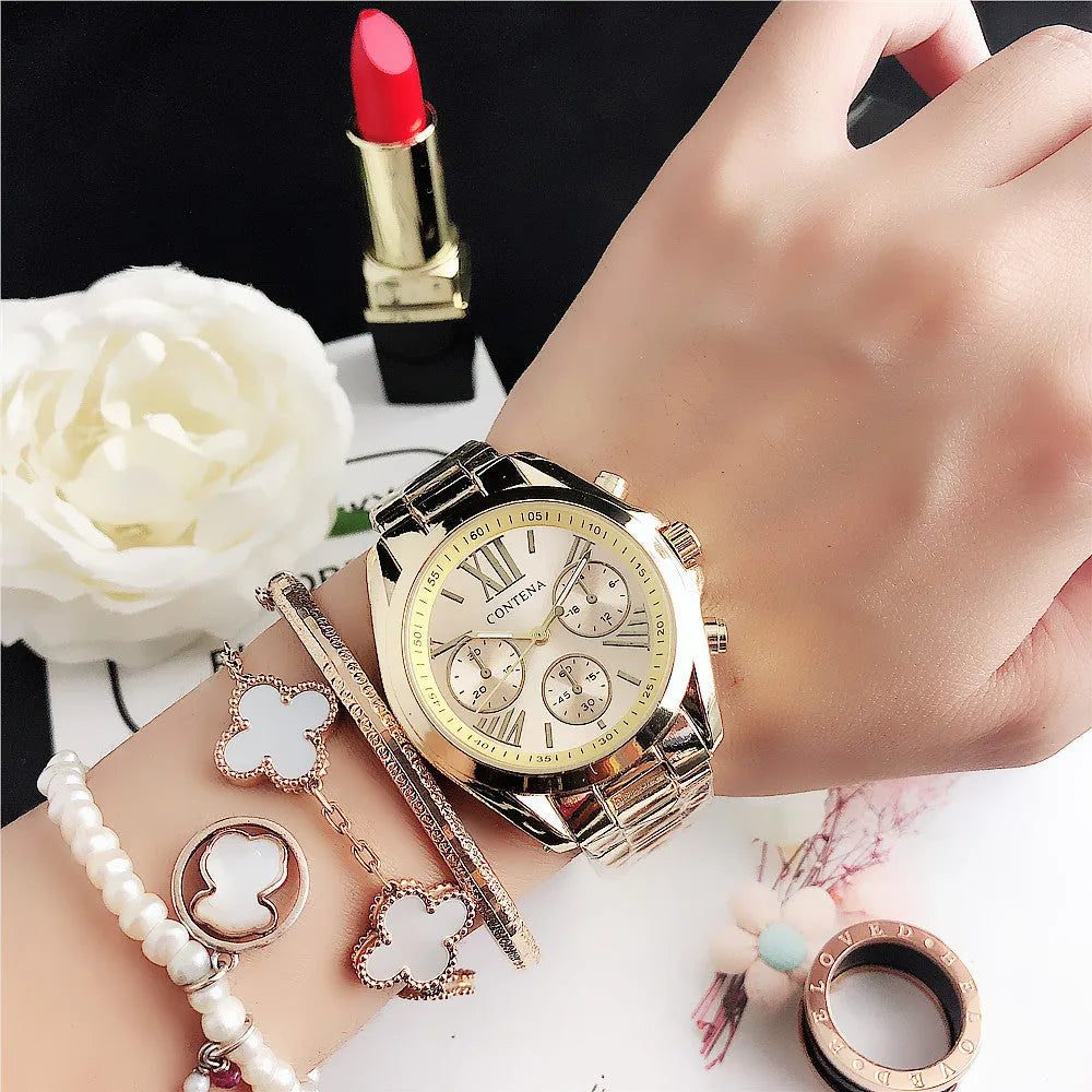 Women's silver and rose gold quartz watch with mesh strap and pointer display.