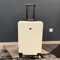 Ultra-light mute universal wheel draw-bar luggage in ABS PC material, 20 inch, black colour, shown on floor