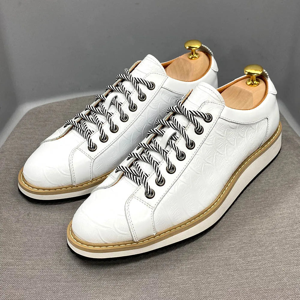 Men's low-top handmade shoes with an embossed pattern and front lace closure, shown in multiple colours.