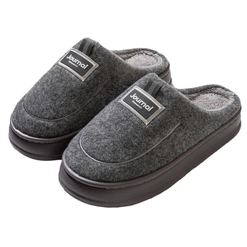 Men's brown and grey suede slippers with a thickened sole, shown from the side.