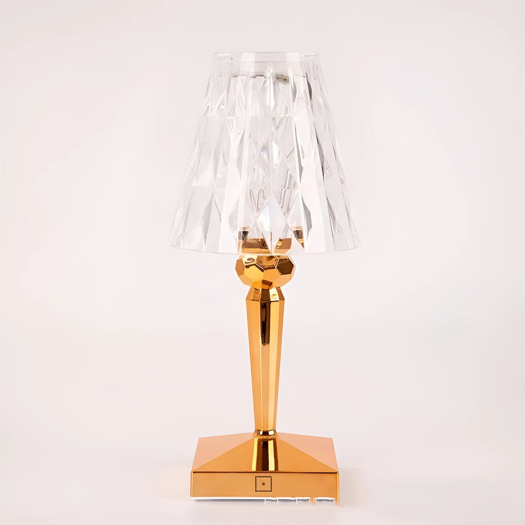 Rose gold portable touch night light with adjustable three-colour lighting on wooden surface