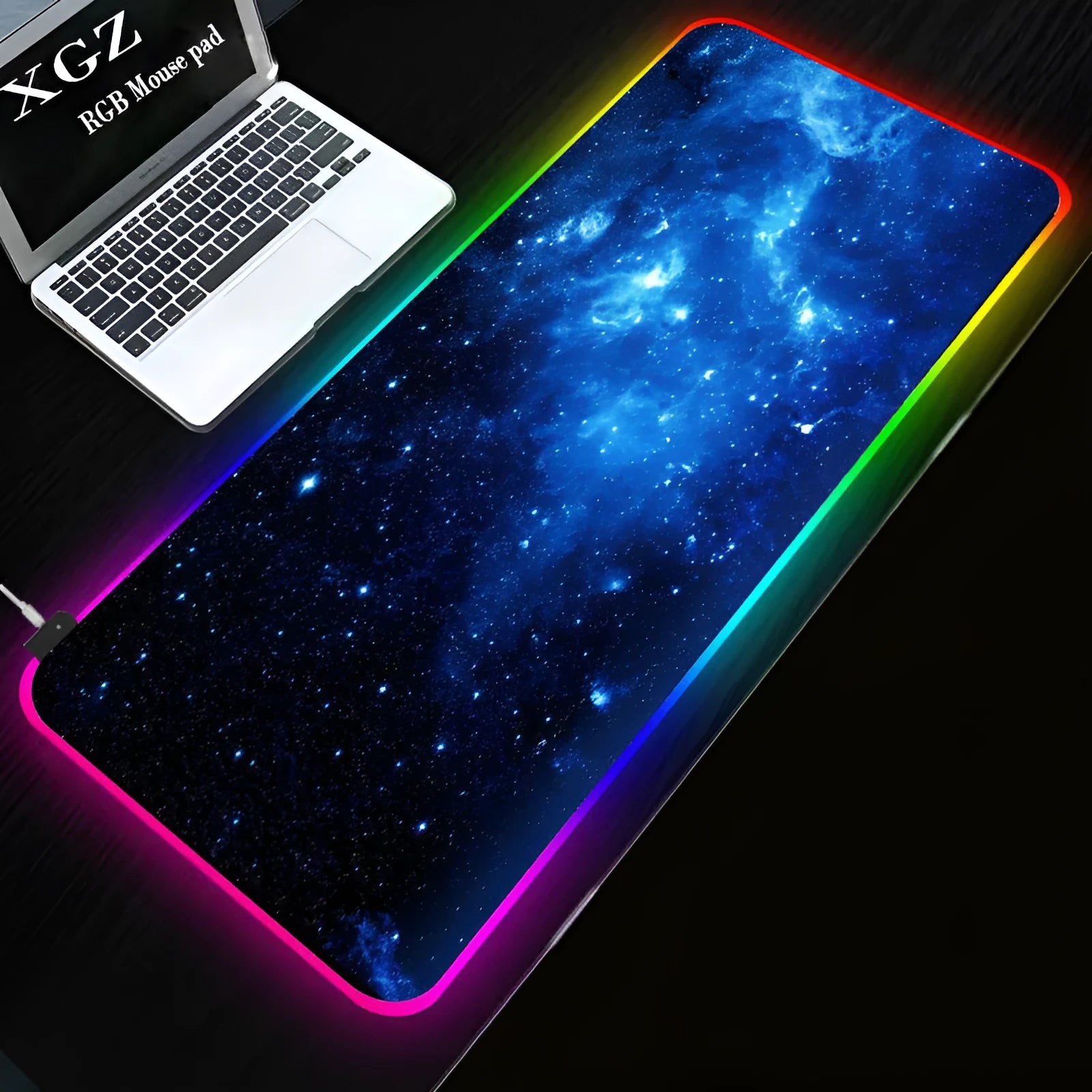 RGB illuminated starry sky pattern mouse pad with natural rubber non-slip base on desk
