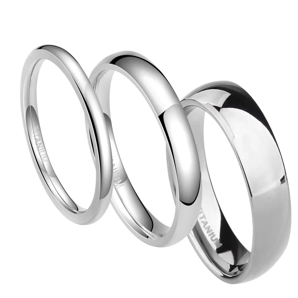 Silver titanium steel ring shown in a minimalist style on a finger, demonstrating its width options.