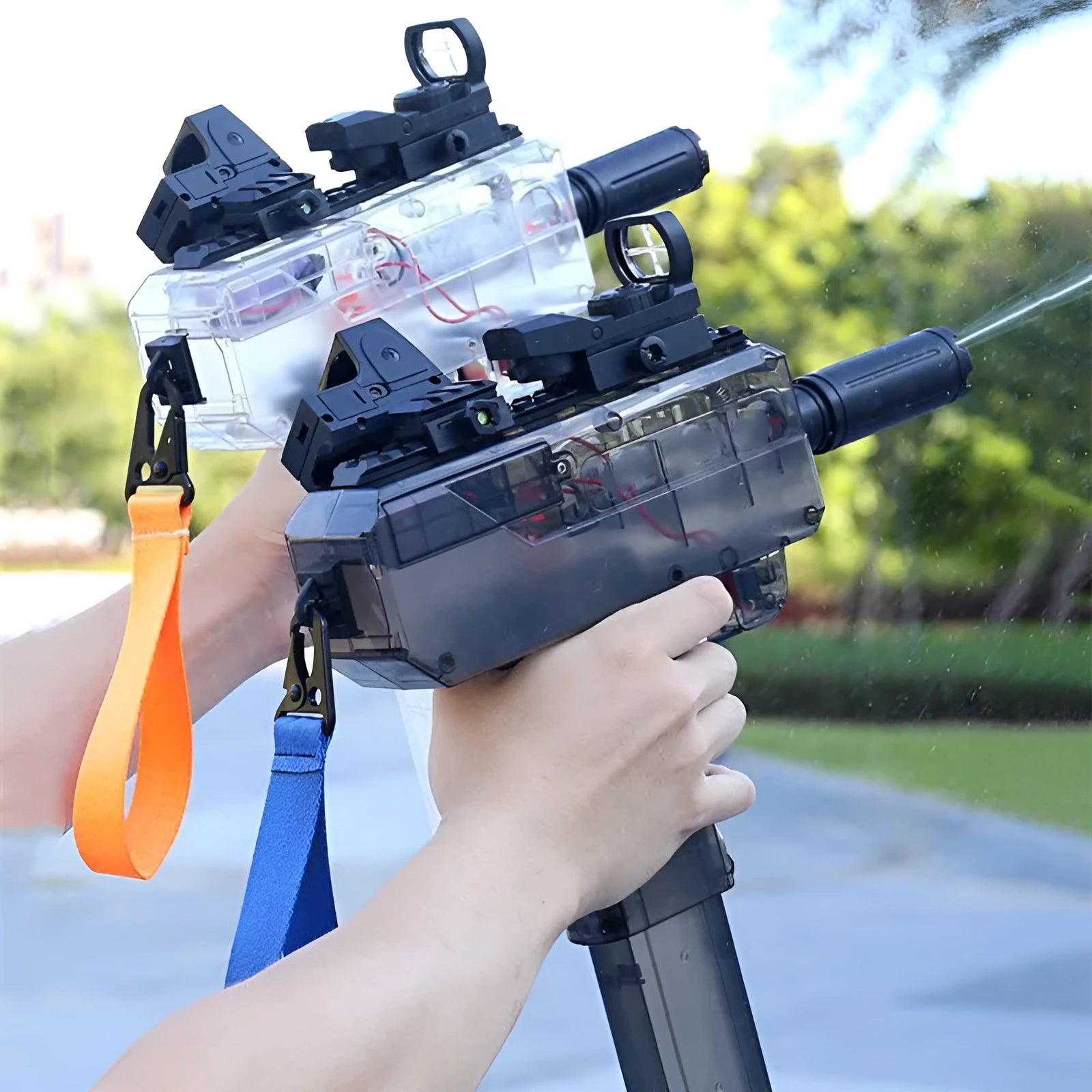 Transparent blue electric water gun toy with accessories on a white background.